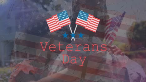 Animation-of-veterans-day-text-over-soldier-with-daughter
