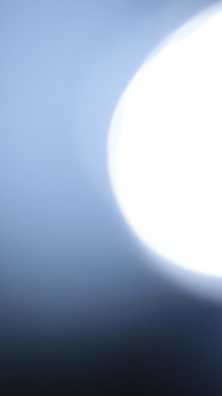 Abstract Blue Light Leak and Lens Flare Transition