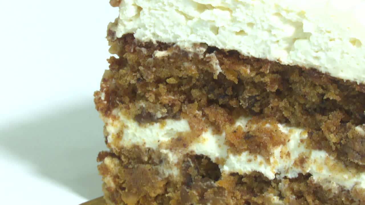 Slice of Carrot Cake with Creamy Frosting