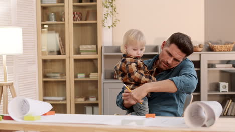 engineer working from home with toddler