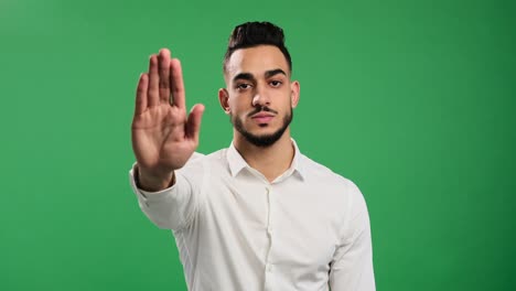 businessman saying no with stop hand sign