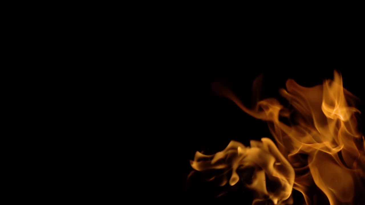 Flames of fire on black background in slow motion