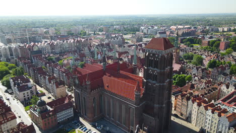 Point-of-view-aerial-of-St-Marys-Basilica-in-the-gothic-old-town-of-the-city-of-Gdansk-Poland