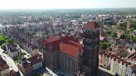 point of view aerial of st marys basilica in the gothic old town of the city of gdansk poland