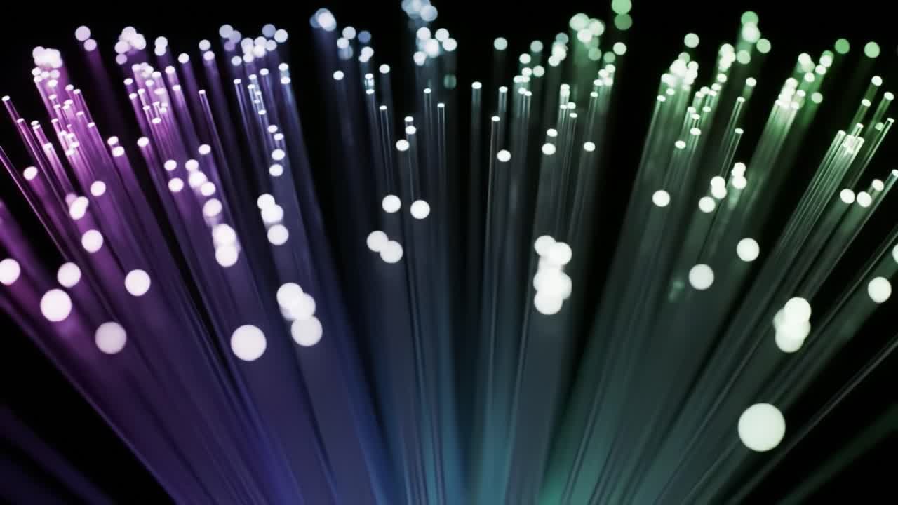 Shimmering light strands move dynamically against a dark background, creating an ethereal ambiance. The interplay of light and shadow captures attention and sparks imagination.