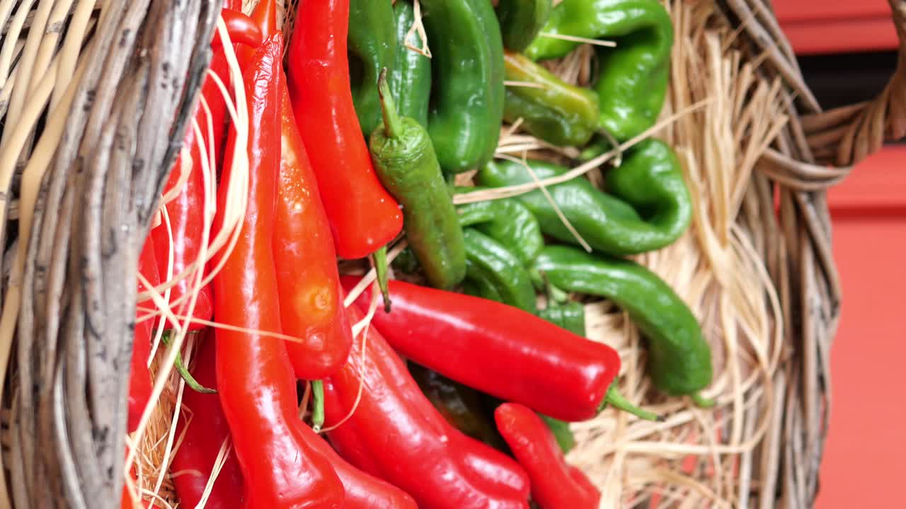 Red and Green Peppers in a Basket