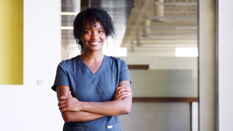 young black female doctor wearing scrubs