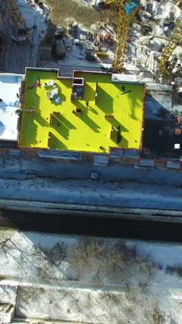 construction of modern building. aerial view of high construction building with cranes