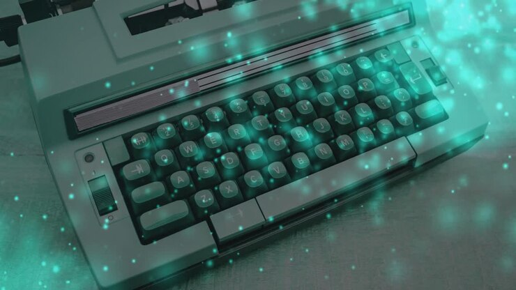 Animation of sparkles over vintage typing machine on wooden surface