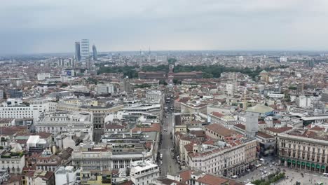 majestic cityscape rooftops of milan city, aerial drone view