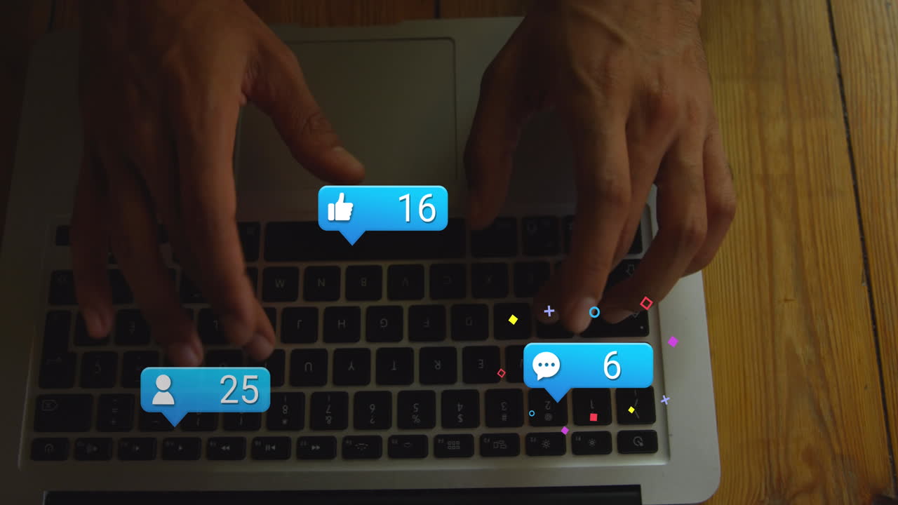 animación de números y iconos cambiantes en cajas de mensajes, manos recortadas de un hombre biracial usando una computadora portátil
