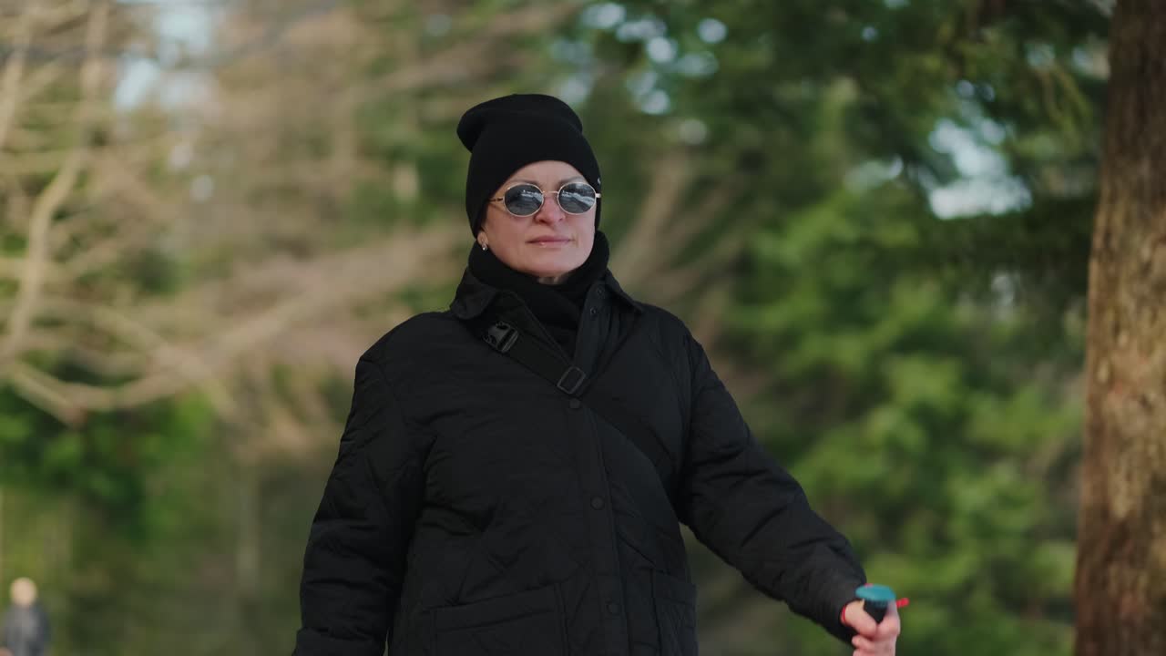 Woman Nordic Walking in a Park