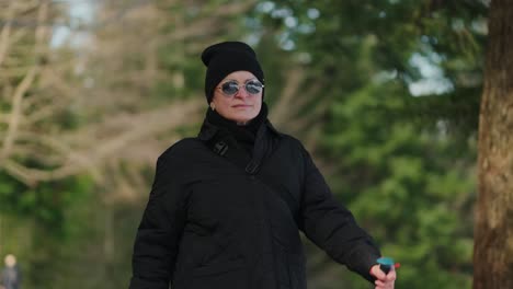 woman nordic walking in a park