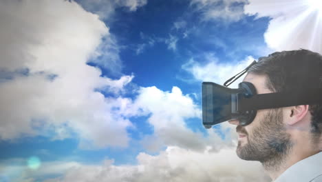 animation of man wearing vr headset against sky with clouds