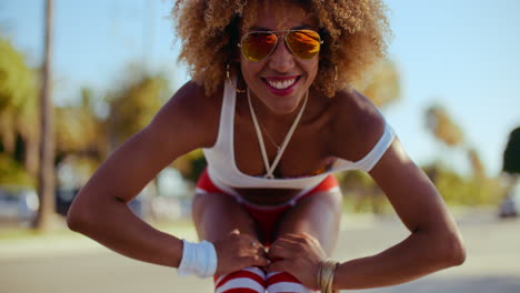 sexy happy girl doing poses on her roller skates