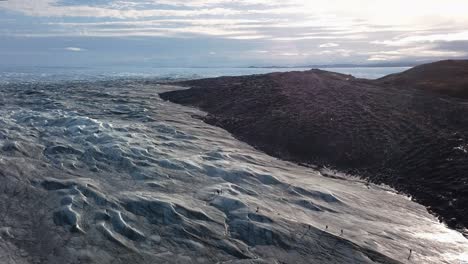 Aerial-view-over-the-icecap-at-pinot-660,-just-outside-Kangerlussuaq,-Greenland