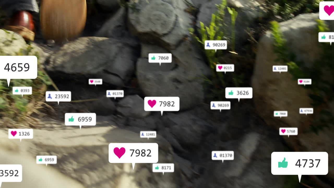 Social media likes and notifications animation over rocky outdoor landscape