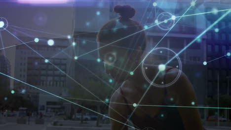woman catching breath in urban plaza, showing fitness tech with glowing network lines and nodes