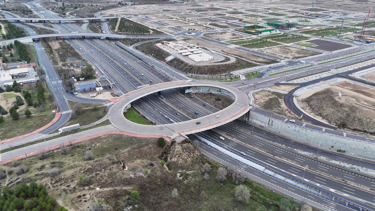 Urban highway in Madrid with lanes and infrastructure aerial view