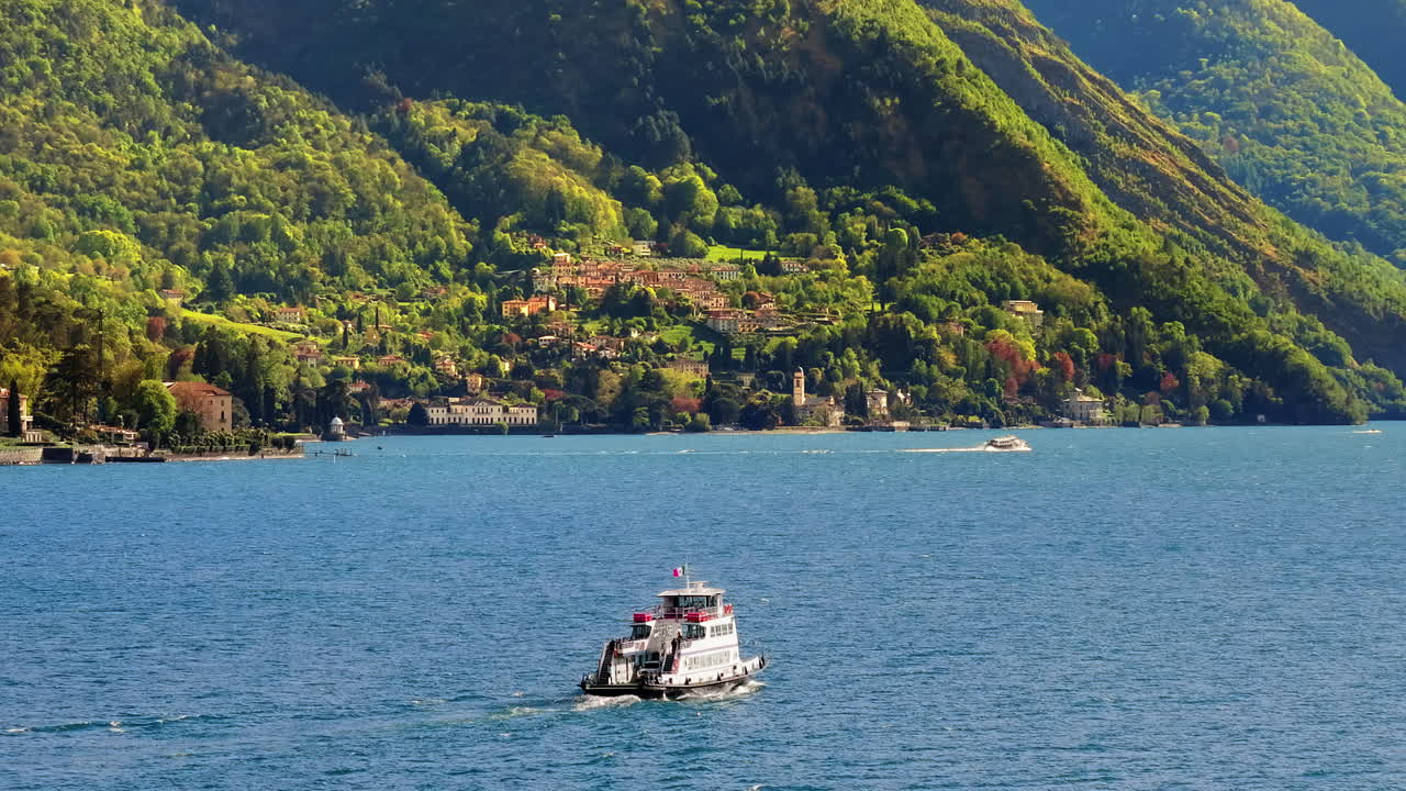 Ship navigating on Lake Como, Italy on a sunny day