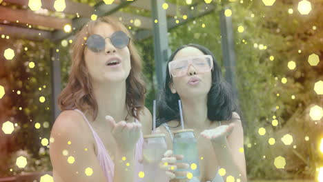 holding drinks and blowing kisses, women with sunglasses over glowing hexagons animation