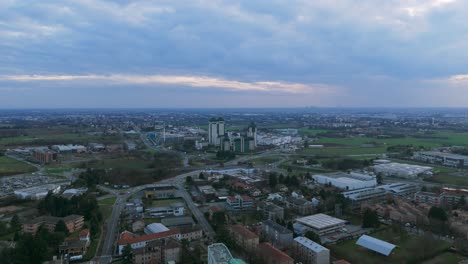 flying over vimercate city in lombardy, region of northern italy