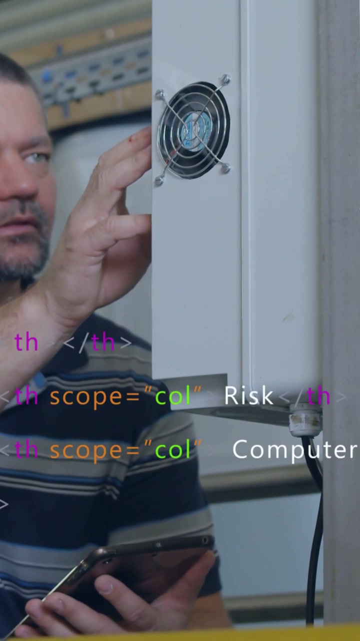 Tech using phone and checking fan grille screws to fix, security keywords scrolling over man
