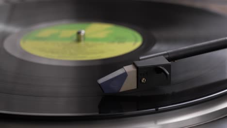 a close-up of a gramophone record playing