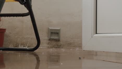 Autumn-rain-making-puddles-on-the-balcony