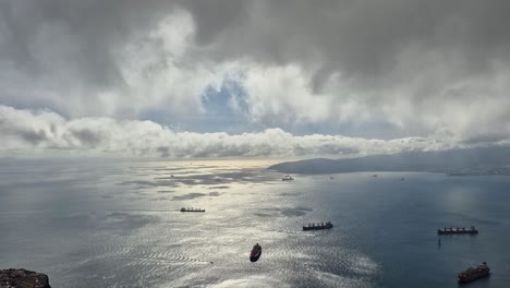 aerial view over the strait of gibraltar with fast moving clouds