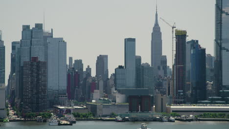 skyscrapers of midtown manhattan on clear summer day