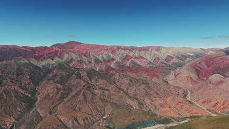 an open-air canvas known as el hornocal, or cerro de los 14 colores, showcasing vibrant colors and stunning geological formations in the quebrada de humahuaca, jujuy, argentina