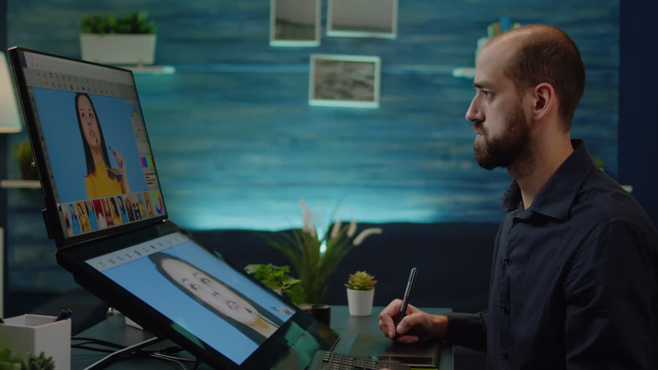 Photography artist using editing software on touch screen