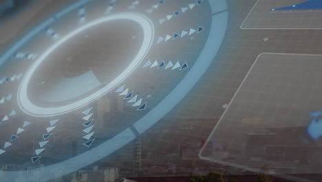animation of interface with data processing against aerial view of cityscape