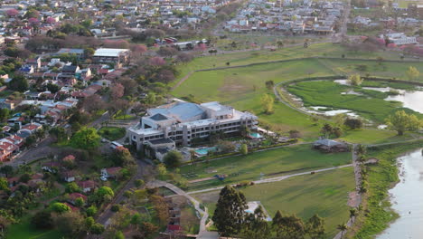 aerial view of a lakeside hotel and resort