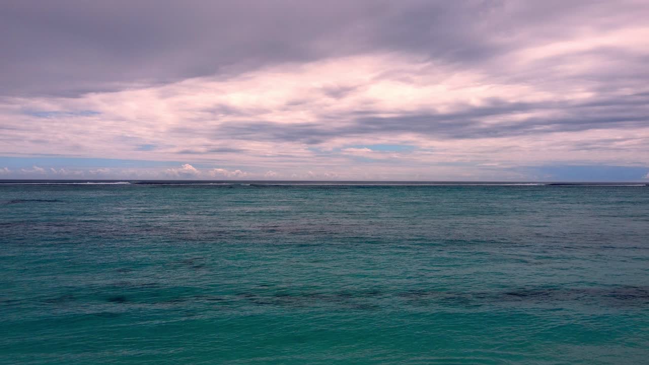 Aerial view of Le Morne Beach, showcasing the pristine turquoise waters and stunning coral reefs.