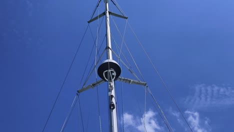 boat mast with equipment and blue sky