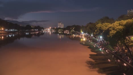 night river scene with people