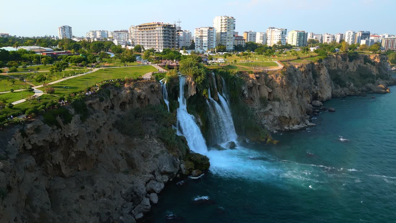 4K Cinematic aerial video capturing the unique beauty of Lower Düden Falls where freshwater meets the Mediterranean -Antalya - Turkey_04