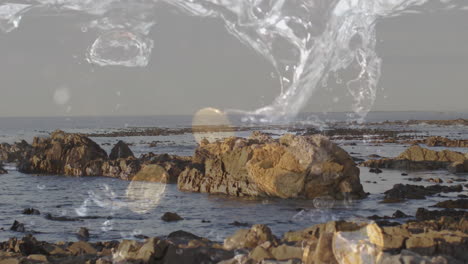 crashing waves over rocky shoreline with splashes and bubbles in animation motion
