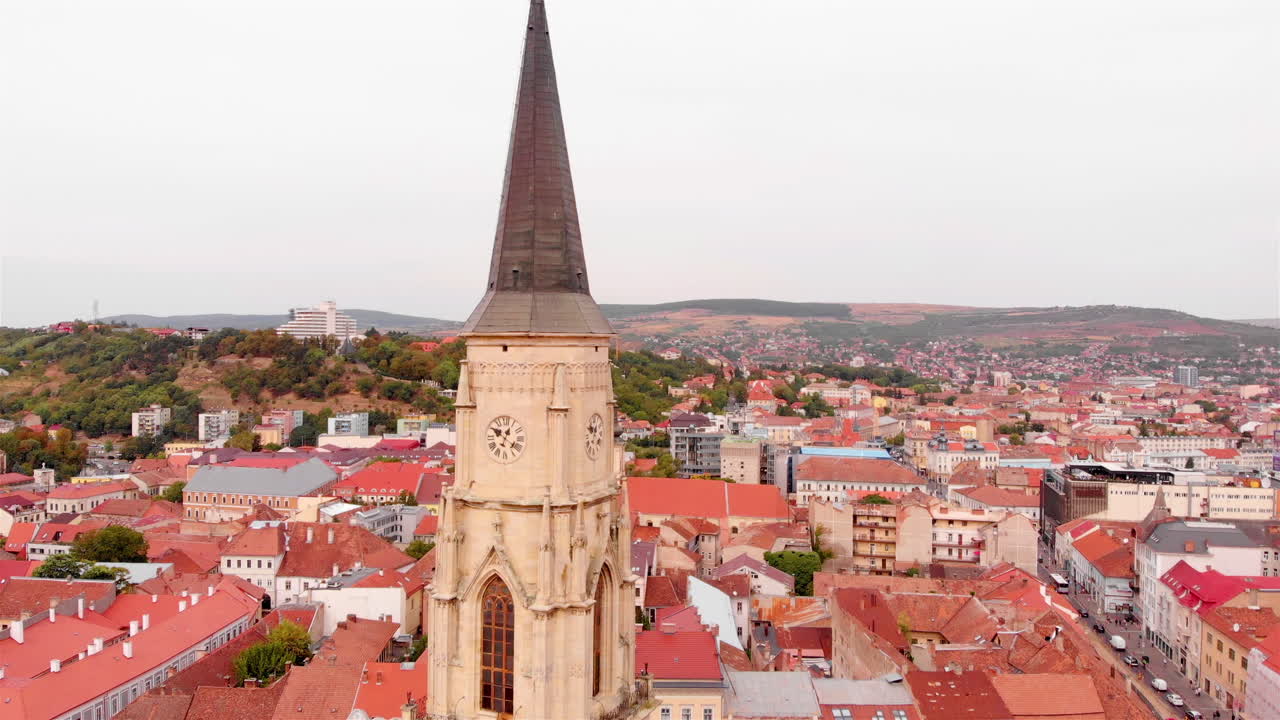Aerial footage over church medieval tower in Romania