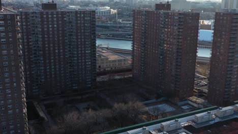 aerial flight towards highrise apartments in the harlem neighborhood of new york city