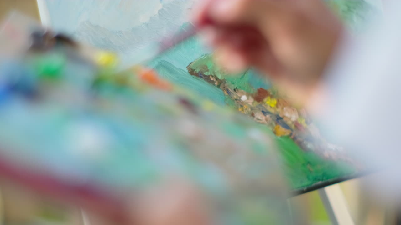 artista pintando un paisaje