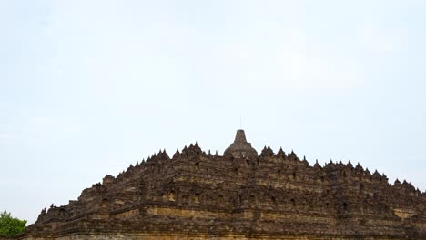 exterior view of borobudur buddhist ancient temple in indonesia, wide panning view