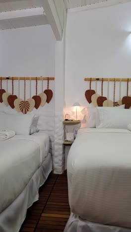 experience the tranquility of a beautifully woven white hammock set in a stylish family room. the bright space features light walls and warm wooden accents enhancing the mood of relaxation