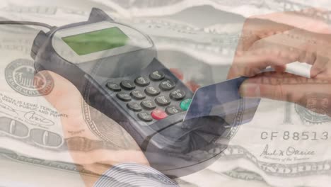 animation of dollar banknotes falling over hand of caucasian man holding payment terminal