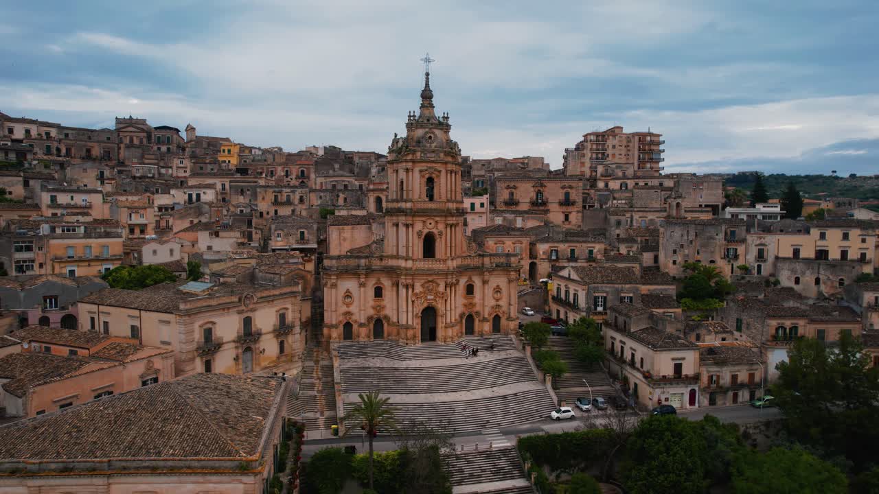 Aerial view over Modica old town streets with the iconic Duomo di San Giorgio. Ragusa, Sicily, Italy