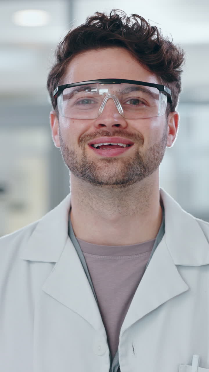 Portrait of a smiling scientist in a lab coat