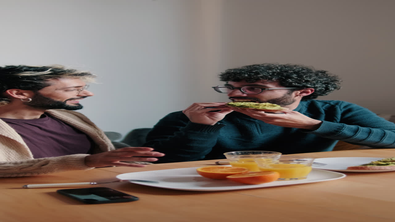 Gay Couple Enjoying Breakfast at Home