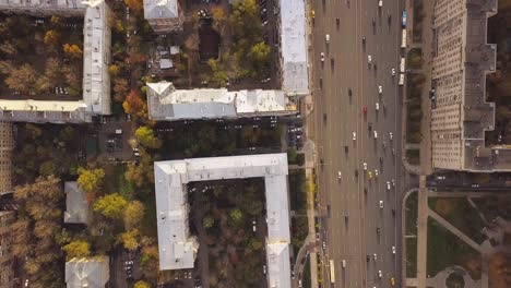 aerial view of city streets and buildings in autumn